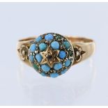 9ct yellow gold domed head ring set with eighteen turquoise cabochons and a central diamond point,