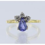 18ct yellow gold tanzanite and diamond ring, pear mix cut tanzanite measures 8mm x 5mm, set with