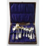 Mixed lot of silver flatware includes three Georgian spoons, Apostle pattern tongs, six coffee