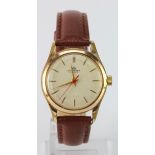 Gents gold plated Bucherer manual wind wristwatch. The cream coloured dial with gilt baton markers