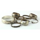 Mixed lot of silver comprising six bangles and three napkins - various hallmarks and marks. Two of