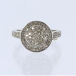 9ct white gold, diamond pave set halo ring with supporting diamond shoulders, total diamond weight