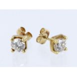 Yellow metal (test's over 14ct) diamond solitaire stud earrings, round brilliant cut diamonds approx