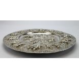 Late 19th century unmarked Indian silver dish/charger - highly decorated & embossed with various