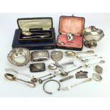 Mixed Silver. A collection of various silver items, including bon bon dish, spoons, cigarette