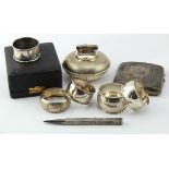 Selction of mixed silver to include lighter, napkin rings, cigarette case etc.