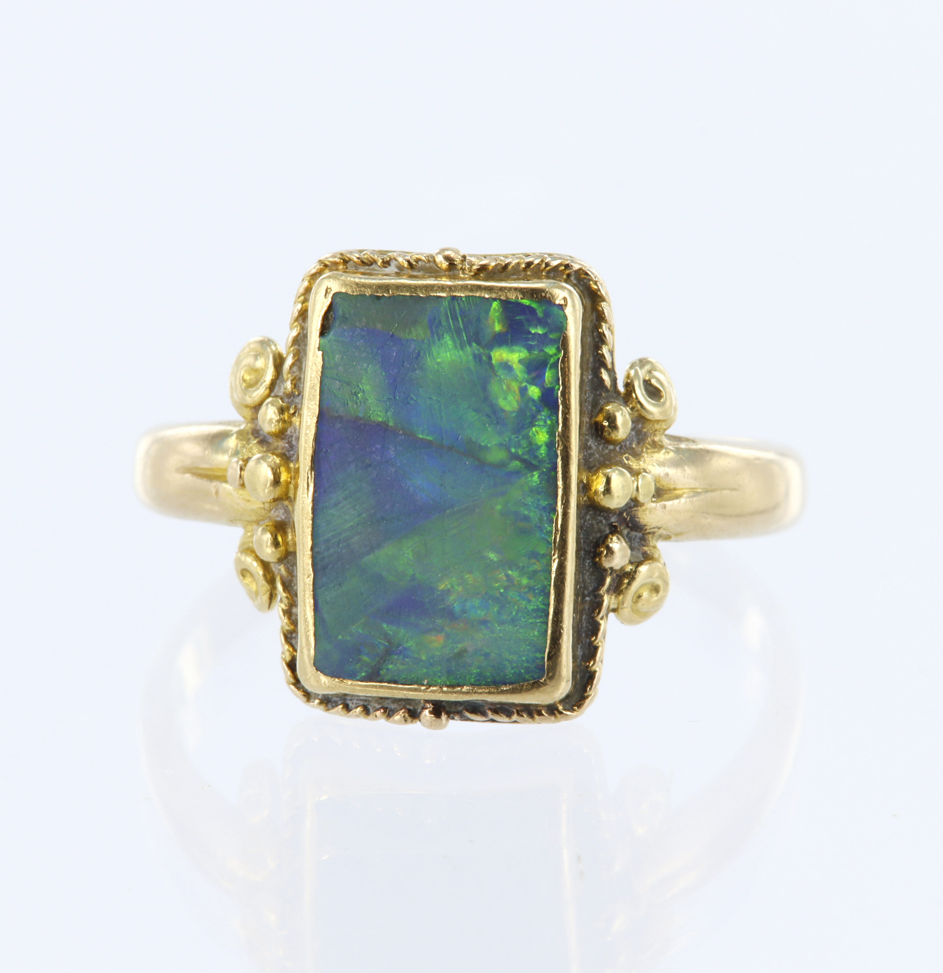 14ct yellow gold ring with rectangular opal measuring approx. 12mm x 8mm (some cracking) set in a