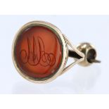 9ct yellow gold fob set with an oval carnelian with carved initials, measuring approx. 25mm x