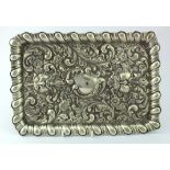 Silver dressing table tray, highly ornate with two faces on it. Hallmarked GS & FS Birm. 1902.