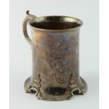 Victorian silver cup with single scroll handle, engraved intials within an ornate border to side,