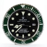 Advertising Wall Clock. Green 'Rolex' advertising wall clock, black dial reads 'Rolex Oyster