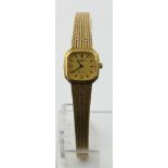 Ladies 9ct cased Longines quartz wristwatch on a 9ct integral bracelet. Total weight 24.1g. Watch