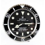 Advertising Wall Clock. Black 'Rolex' advertising wall clock, black dial reads 'Rolex Oyster