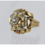 Tests 18ct yellow gold ring, set with a CZ, table diameter 21mm x 24mm, finger size T, weight 6.4g.