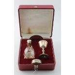 Silver travelling communion set, hallmarked 'A.E.J., Birmingham 1963 / 1964', contained in