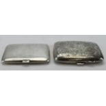 Two silver cigarette cases - one is plain and one has a floriate engraved design, hallmarked