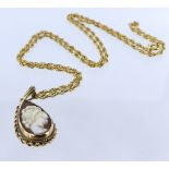 9ct yellow gold teardrop shaped cameo pendant measuring approx. 30mm x 15mm on a rope chain with