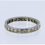 Platinum full eternity ring set with approx. twenty nine round old cut diamonds, totalling approx.