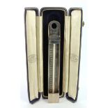 Silver thermometer, hallmarked 'G&SCo.Ltd, London 1932', engraved with crown and initials 'R.H'