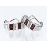 18ct white gold earrings with post and clip fittings for pierced ears, each set with six rectangular