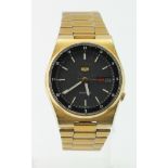 Gents gold plated Seiko 5 automatic wristwatch. Working when catalogued and on its original