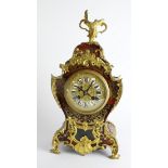 Gilt boulle ormolu mantel clock, with French Movement marked 'B', gilt dial with enamel Roman