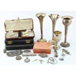 Mixed silver. A group of various silver items, including two cased sets of teaspoons, flower