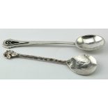 Two Modernist unmarked silver Arts & Crafts spoons . Total weight of both items 1.75 oz