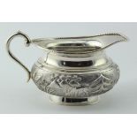 Indian (probably) silver cream jug (probably late 19th century) shows interesting scene round the