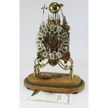 Triple Fussee skeleton clock 'The Modern Passing Strike Skeleton Clock', strikes on a nest of