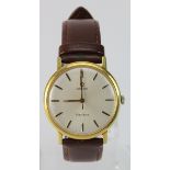 Gents gold plated Omega Geneve manual wind wristwatch. The cream dial with gilt baton markers. Watch