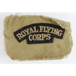 Royal Flying Corps cloth shoulder title on khaki fabric.