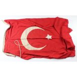 Turkish WW1 flag with various stencilling to the lanyard size approx. 3x5 feet.