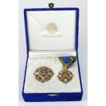 Thailand an Order of the Crown Knight Commander set with neck ribbon in fitted case of issue.