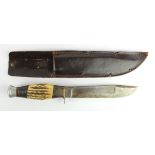 Bowie bladed fighting knife, unmarked, shows age, with scabbard.