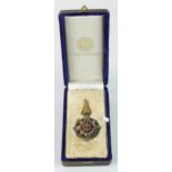 Thailand an Order of the Crown Commander neck badge with ribbon in fitted case of issue.