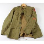 WW1 US soldiers jacket complete with all its insignia and divisional patch no 6 in a red star.