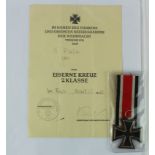 German Nazi Iron Cross 2nd class with award document to G Rauf awarded in the field August 1942.