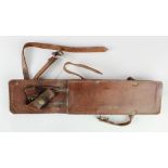 Fighting knife scabbard made of brown leather with two leg straps stamped at the top Bowney &