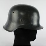 German Nazi raw edge helmet with liner. Single decal. Owners name to inside edge "Buhler". Maker