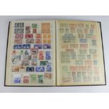 Brown stockbook packed with unmounted mint British Cw KGVI stamps (Qty)