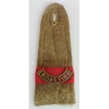 Badge a WW1 shoulder strap with Royal Warwickshire shoulder title over a red flash (Platoon /