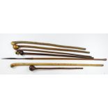 African / Zulu Knobkerries / walking sticks / Clubs, and a good quality tribal Spear. Good lot.