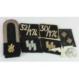 German Nazi SS collar badges hat badge and shoulder epaulet some with the RZ makers labels.