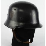 German Nazi Police Helmet with original liner and chin strap, one decal removed. Helmet maker