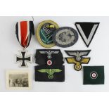 German interest, small job lot of German insignia, medal and photo.