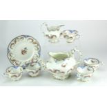 Porcelain tea service, 19th century, Coalport (UNMARKED) comprising: a teapot, teacups and