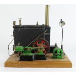 Stuart live steam stationary engine on an oak base, with boiler and lamp, total height 39cm,