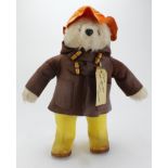 Original Gabrielle Designs Paddington Bear in yellow Dunlop boots, brown coat and orange hat, with