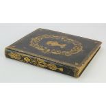 Victorian elaborately decorated morocco leather album, containing numerous illustrations (some